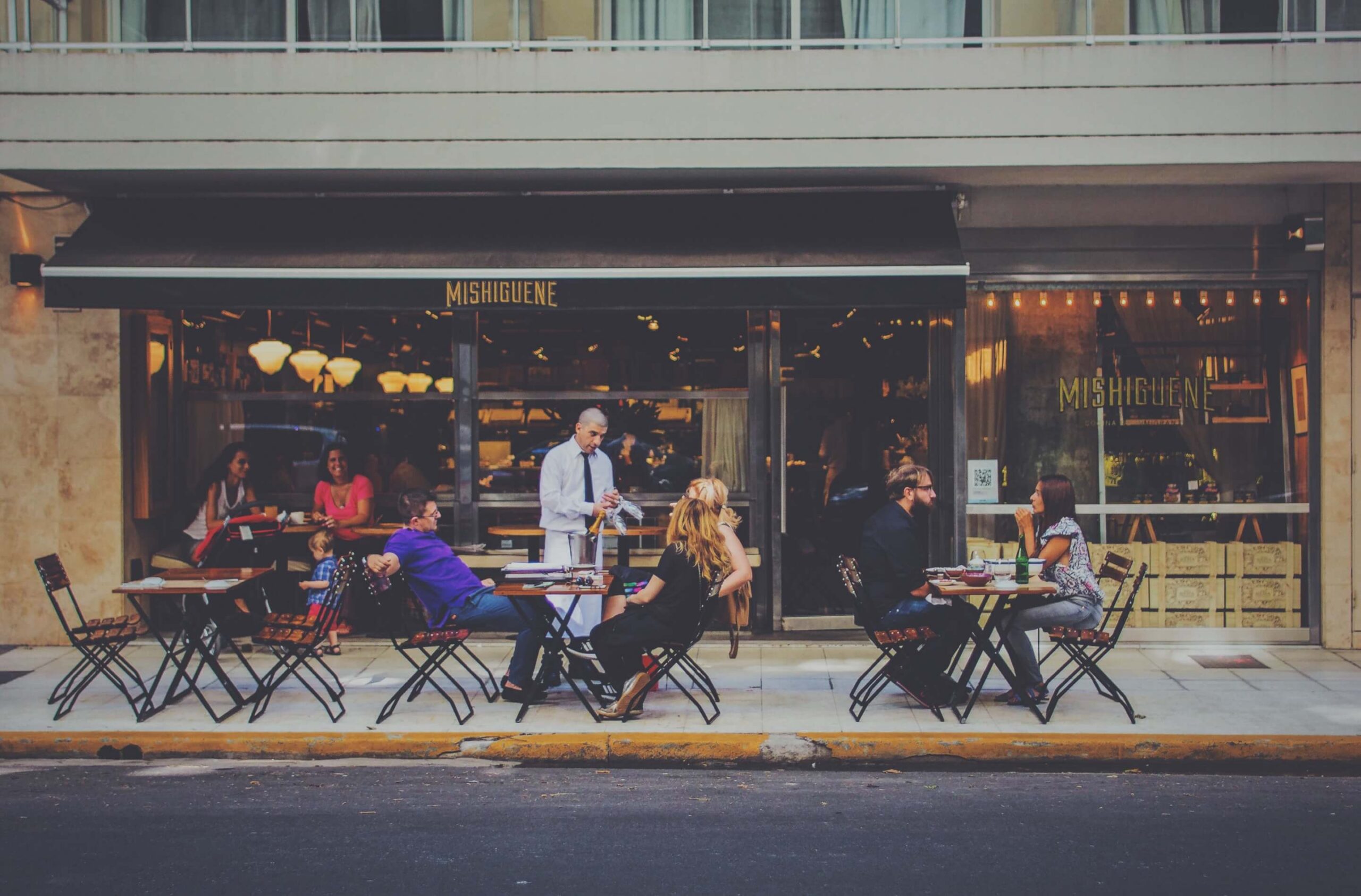 People at Coffee Shop sitting Outside